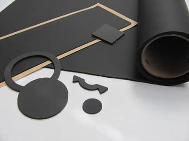 Black rubber sheets and cut-out shapes.
